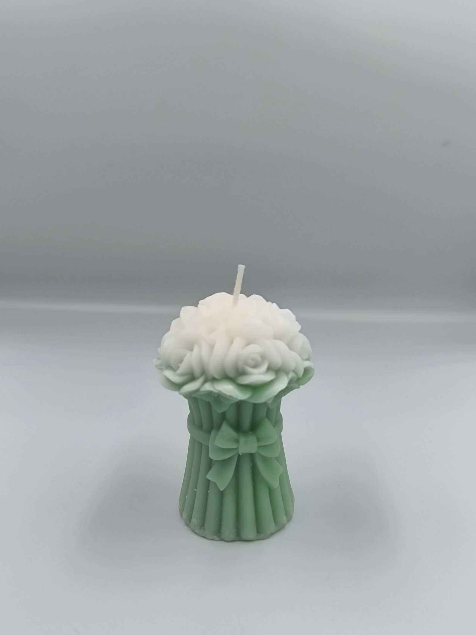 شموع على شكل وردة معطر(12حبة)